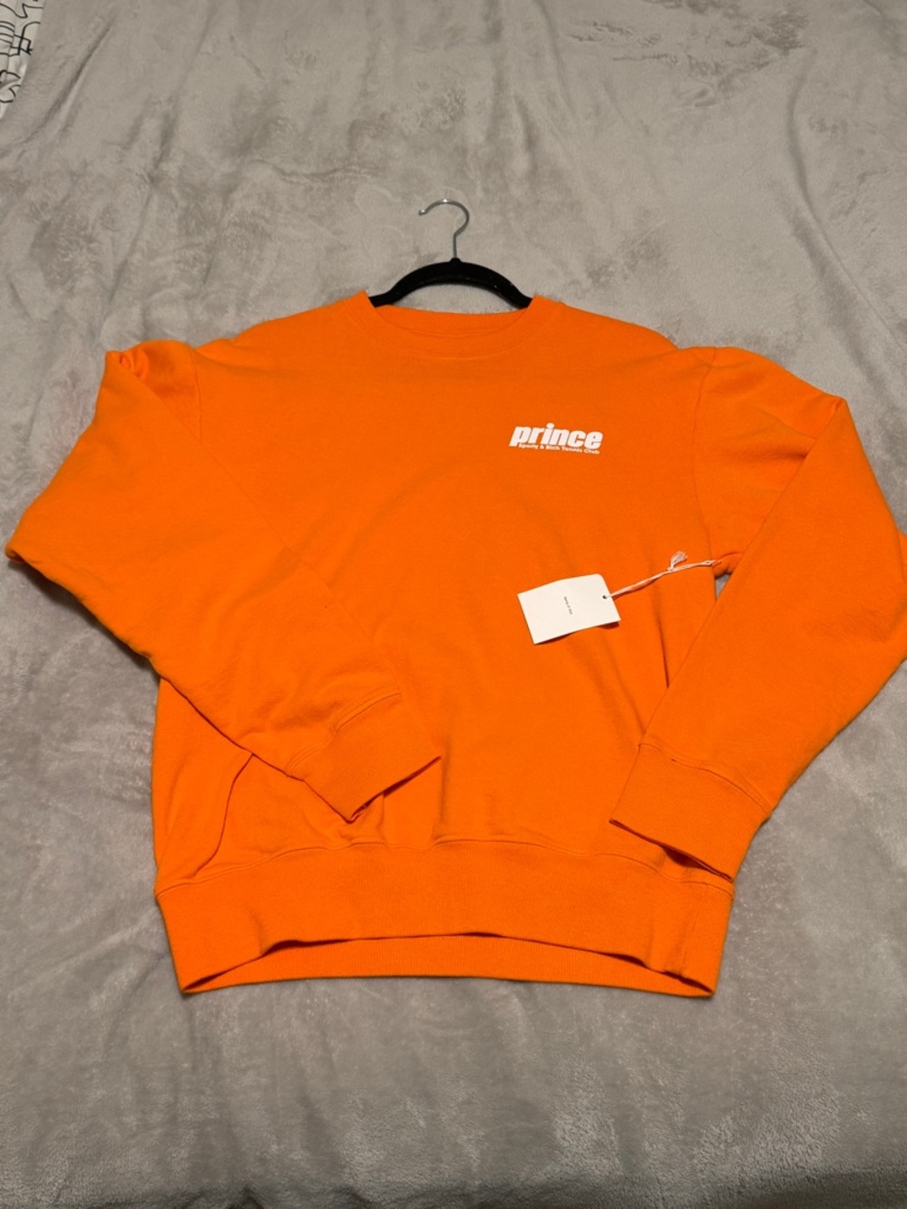 Sporty & Rich Orange Crewneck Sweatshirt with Prince Logo
